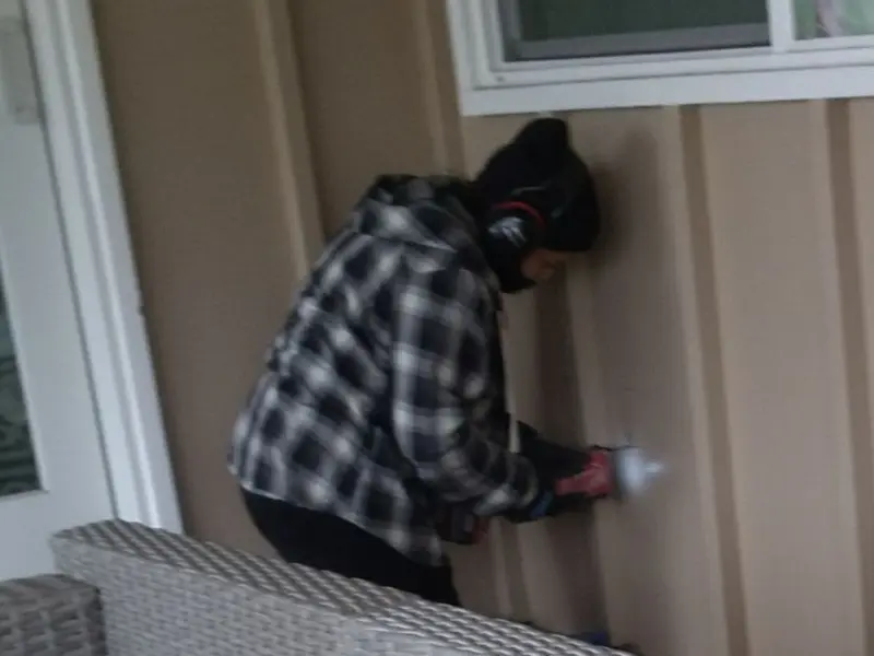 Professional electrician installing an exterior outlet in Berea